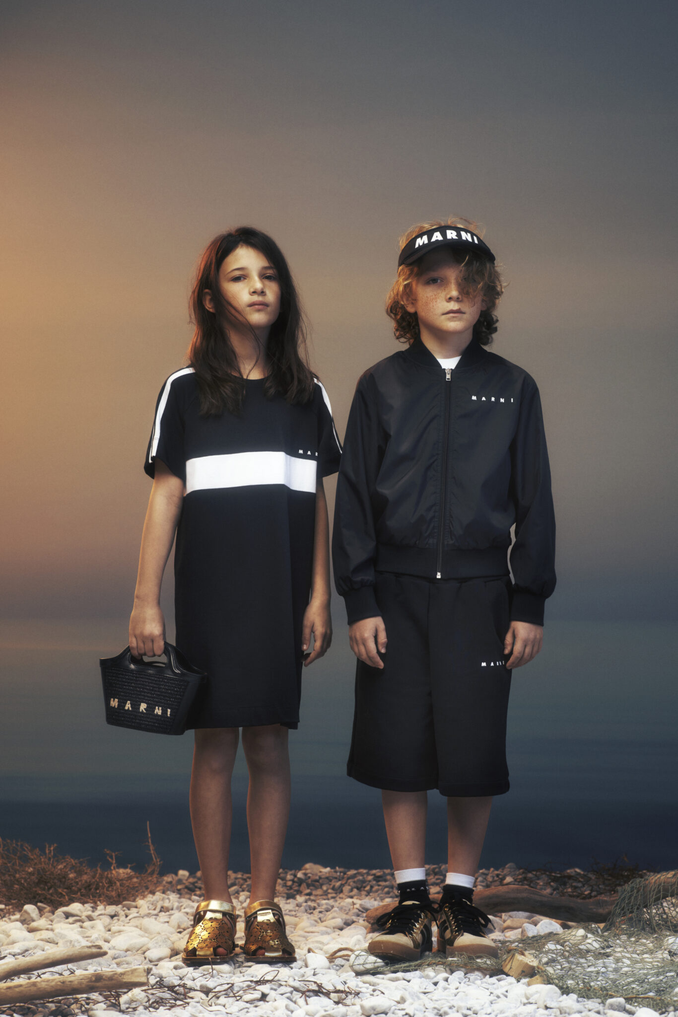 boy & girl on a sunset background