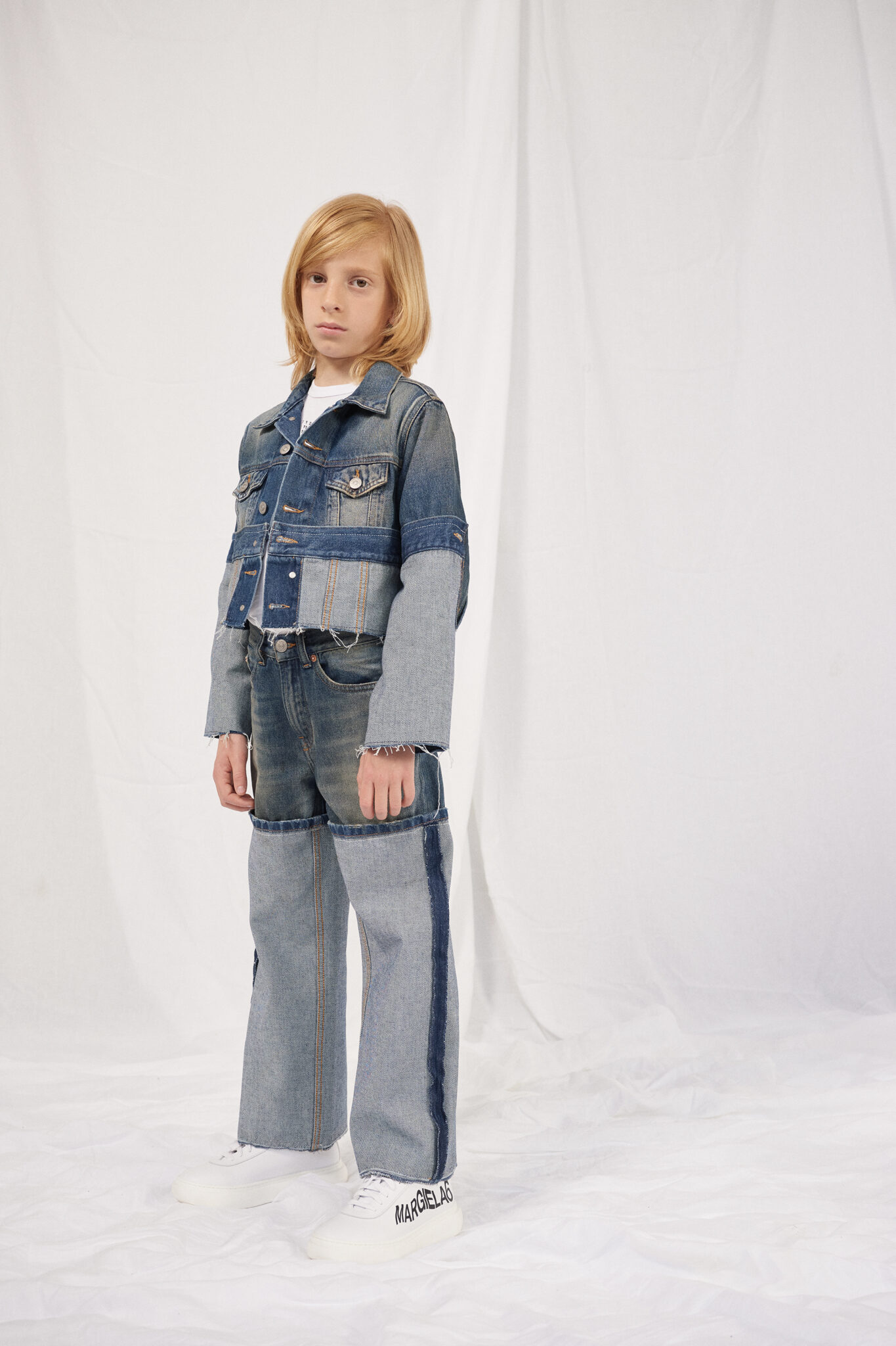 From oversized tops and asymmetrical dresses to cleverly constructed trousers, each piece is designed to break the mold while ensuring ease of movement and wearability. These designs challenge conventional sartorial norms, encouraging young wearers to embrace their individuality.