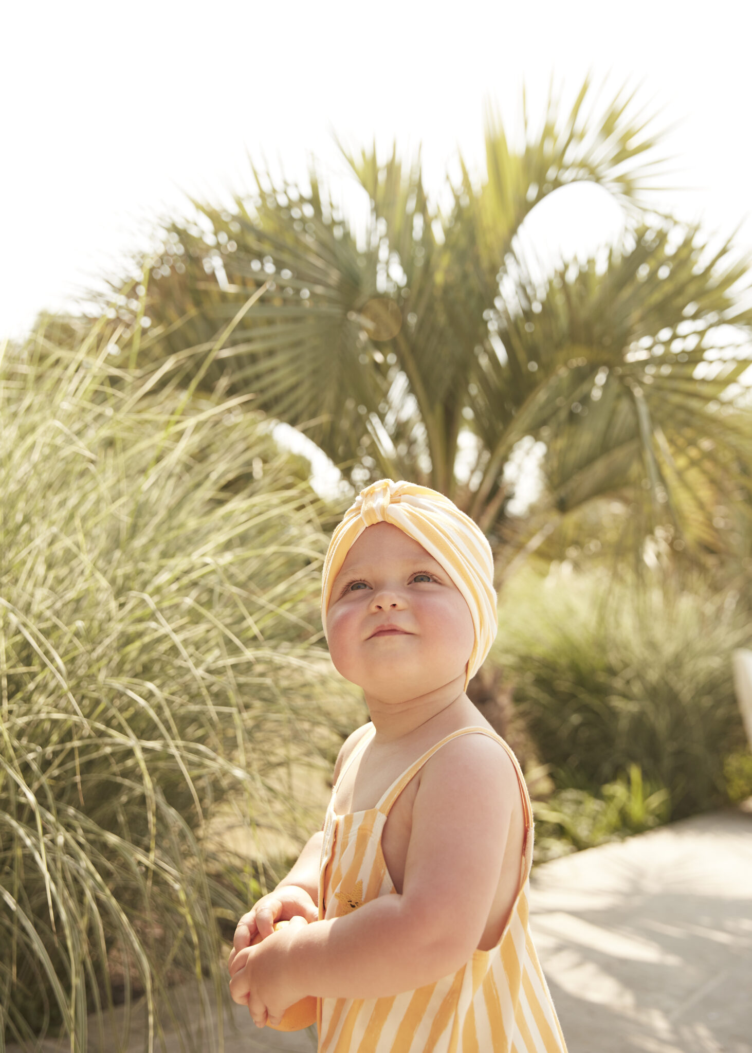 bonniemob-ss2423-CAYMAN- CUTTLE_baby dungaree jumpsuit & TURBAN HAT_ ORANGE STRIPE_BONNIEMOB_SS24_16