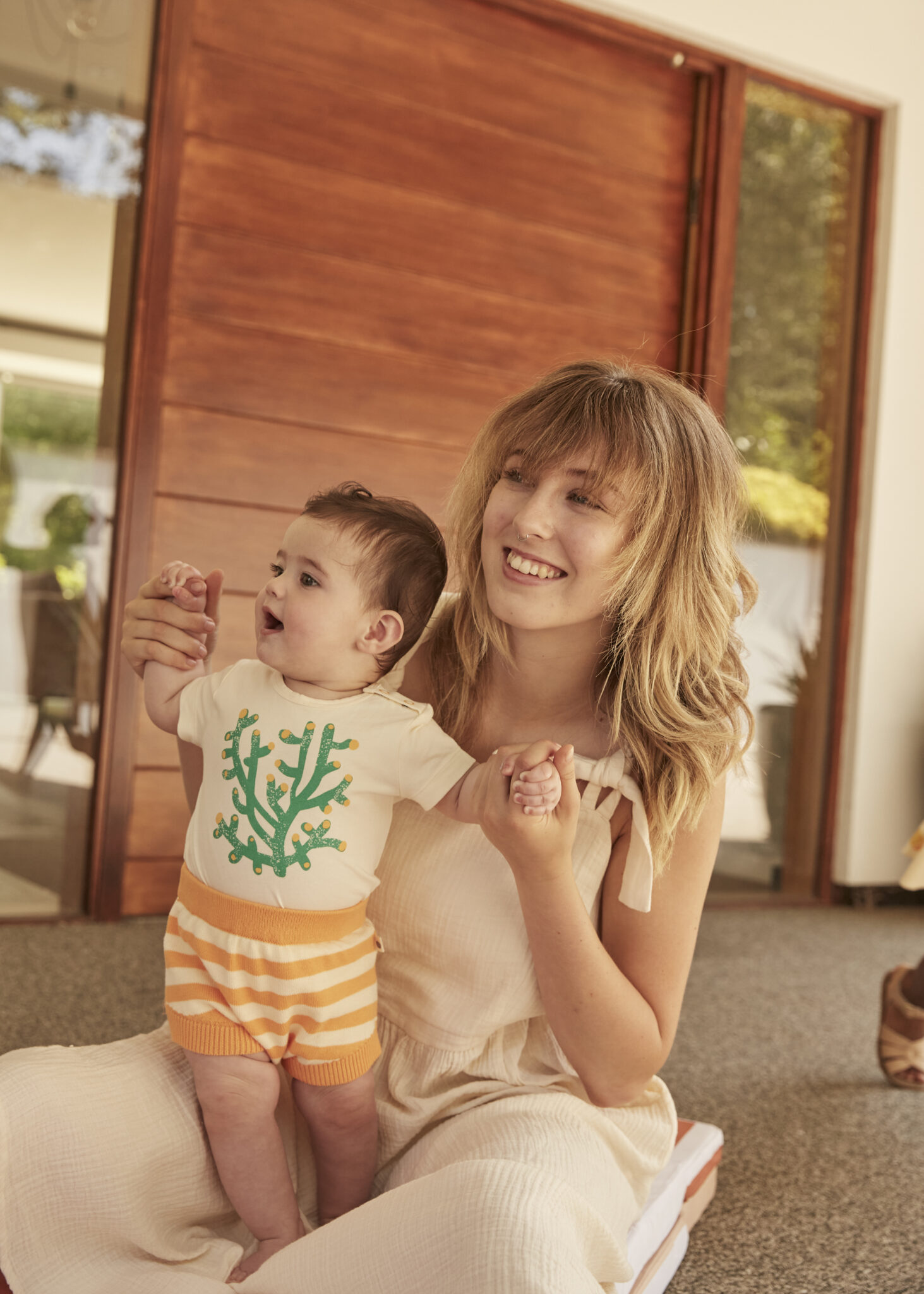 bonniemob-ss2423-CREEK- 3402-241_baby bodysuit_Coral_GILLY_ baby knit bloomwr _Orange Stripe_BONNIEMOB_SS24_2