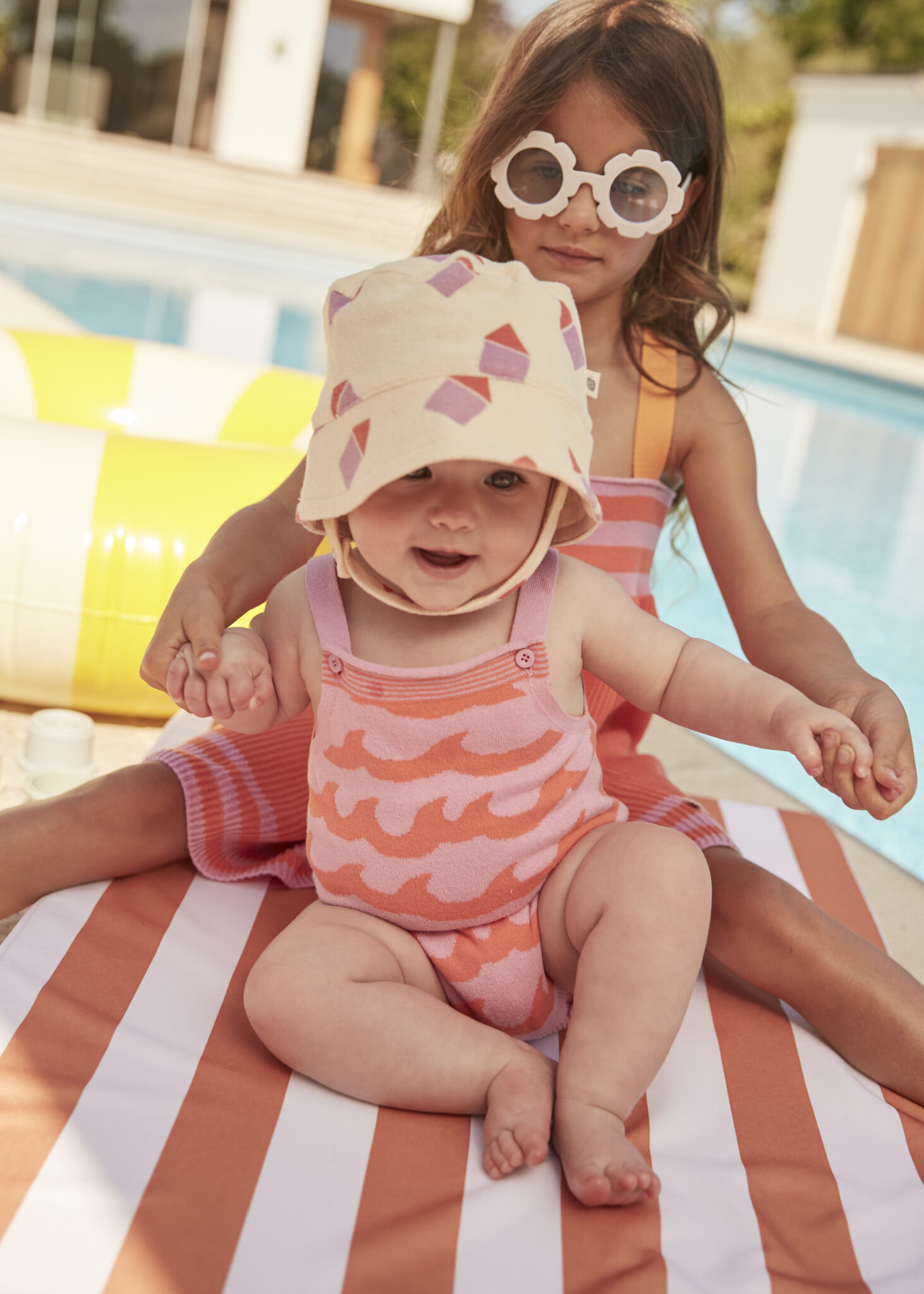 bonniemob-ss2423-GULL_pink_knitted baby romper_SKIPPER_pink baby hat_BAY_ kids knitted dress_ Red_Bonniemob_SS24_7