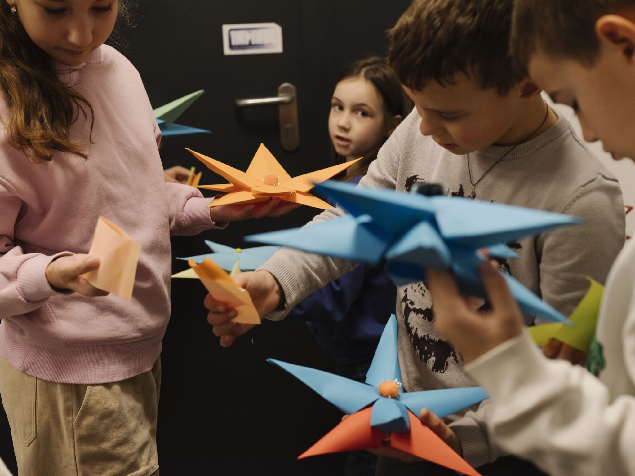 Refugee children from Ukraine play together at a Save the Children Counselling Hub. Romania.© Olivia Arthur _ Magnum Photos