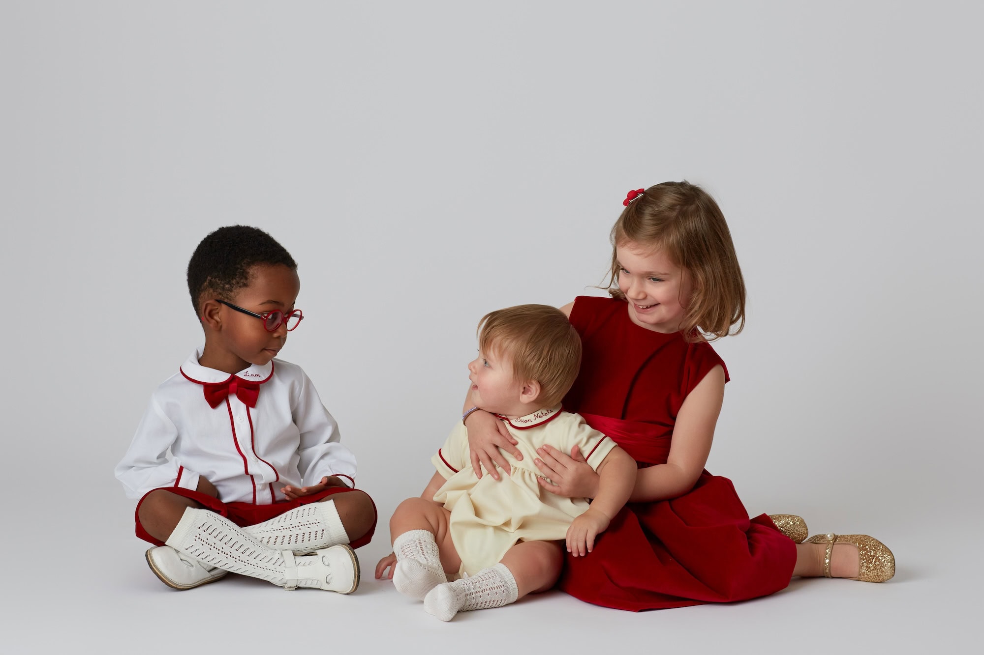 children playing with baby