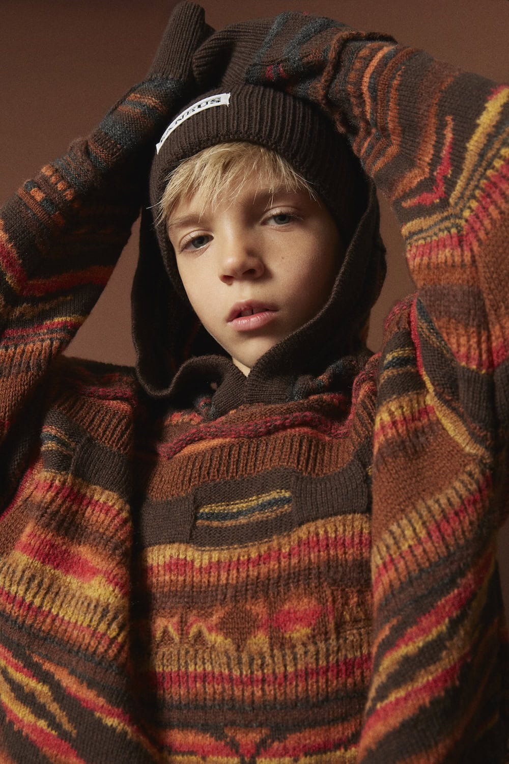 boy wearing knitwear