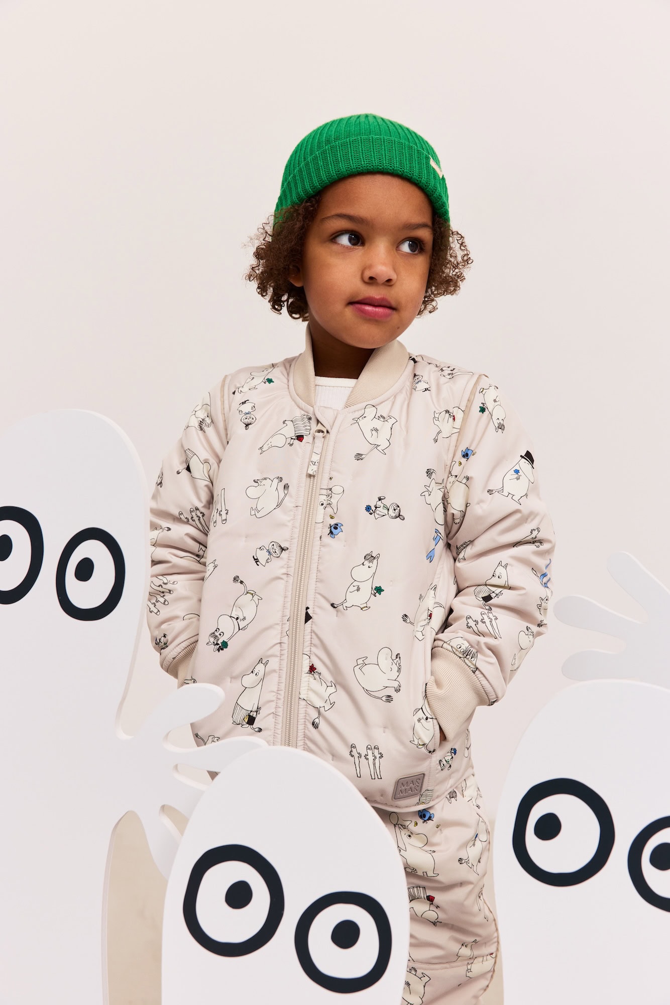 black kid wearing comics outfit