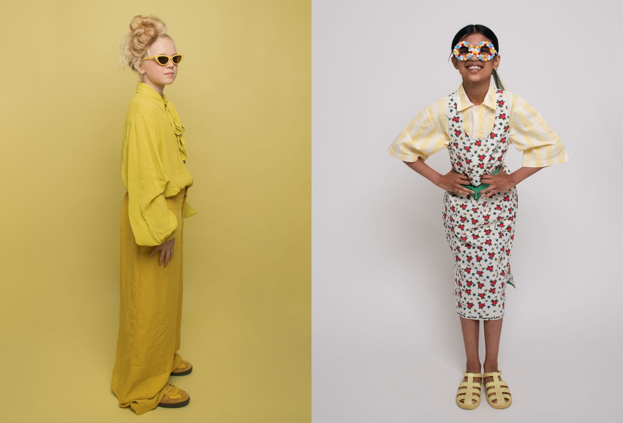 On the left, a girl dressed head-to-toe in vibrant yellow, including wide-leg trousers and cat-eye sunglasses, stands confidently against a yellow background. On the right, a smiling girl wears a floral pinafore over a striped yellow shirt and colorful sunglasses made of pom-poms.