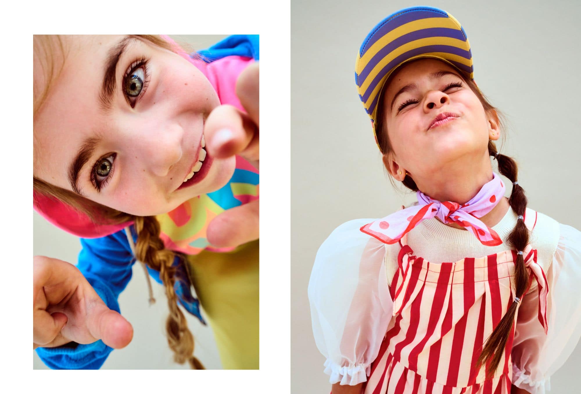 Due bambine in pose giocose e sorridenti. A sinistra, una bambina guarda dritta in camera con sguardo curioso, indossa una felpa colorata e punta le dita verso l’obiettivo. A destra, una bambina con treccia e cappellino a righe viola e gialle stringe gli occhi in una smorfia buffa, indossando un vestito a righe rosse e bianche con maniche a palloncino e foulard rosa a pois. Fotografia di Paola Amenta.