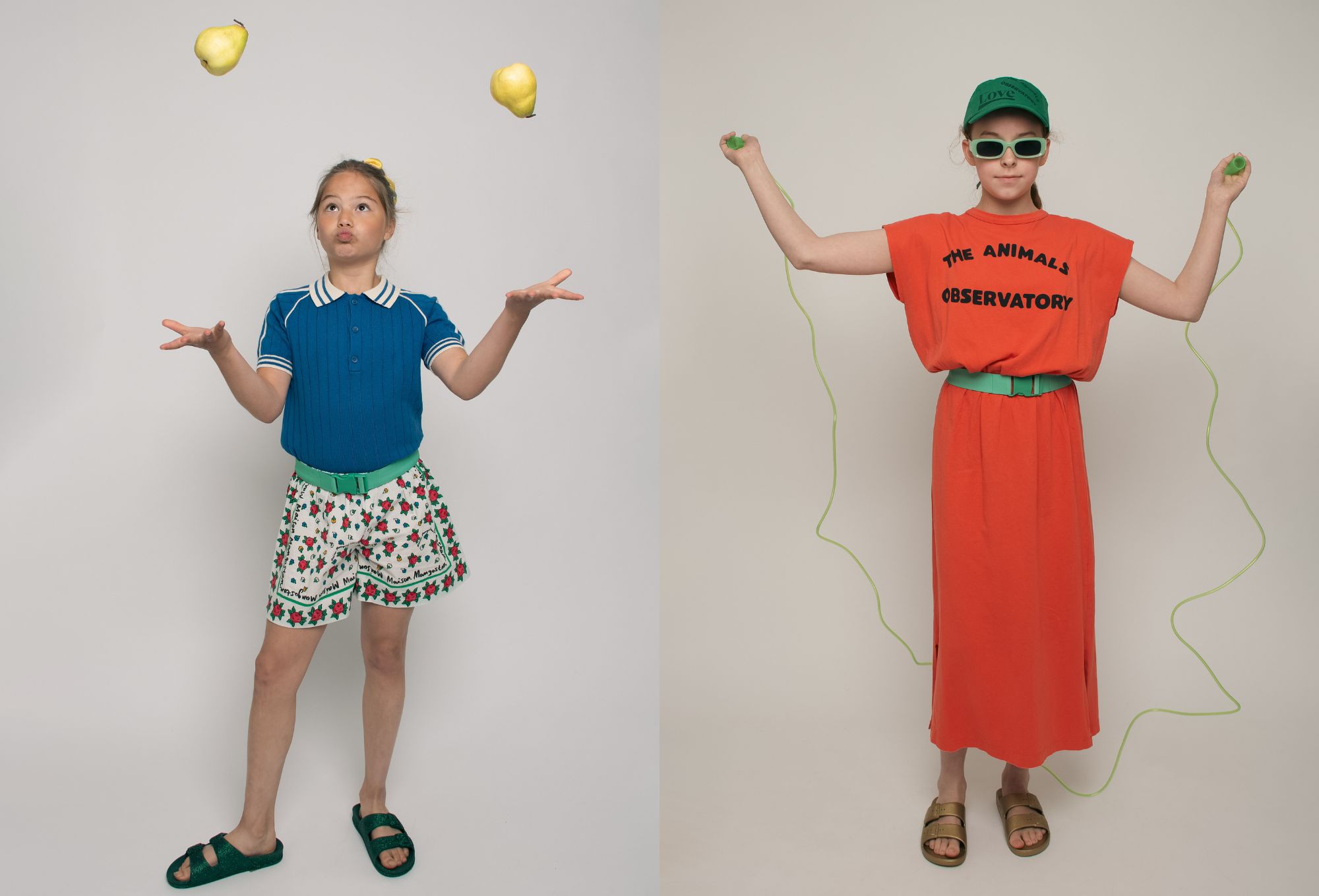 A girl in a blue knit polo juggles two pears with a playful expression, while on the right, another girl in an orange dress and green cap jumps rope with serious focus.