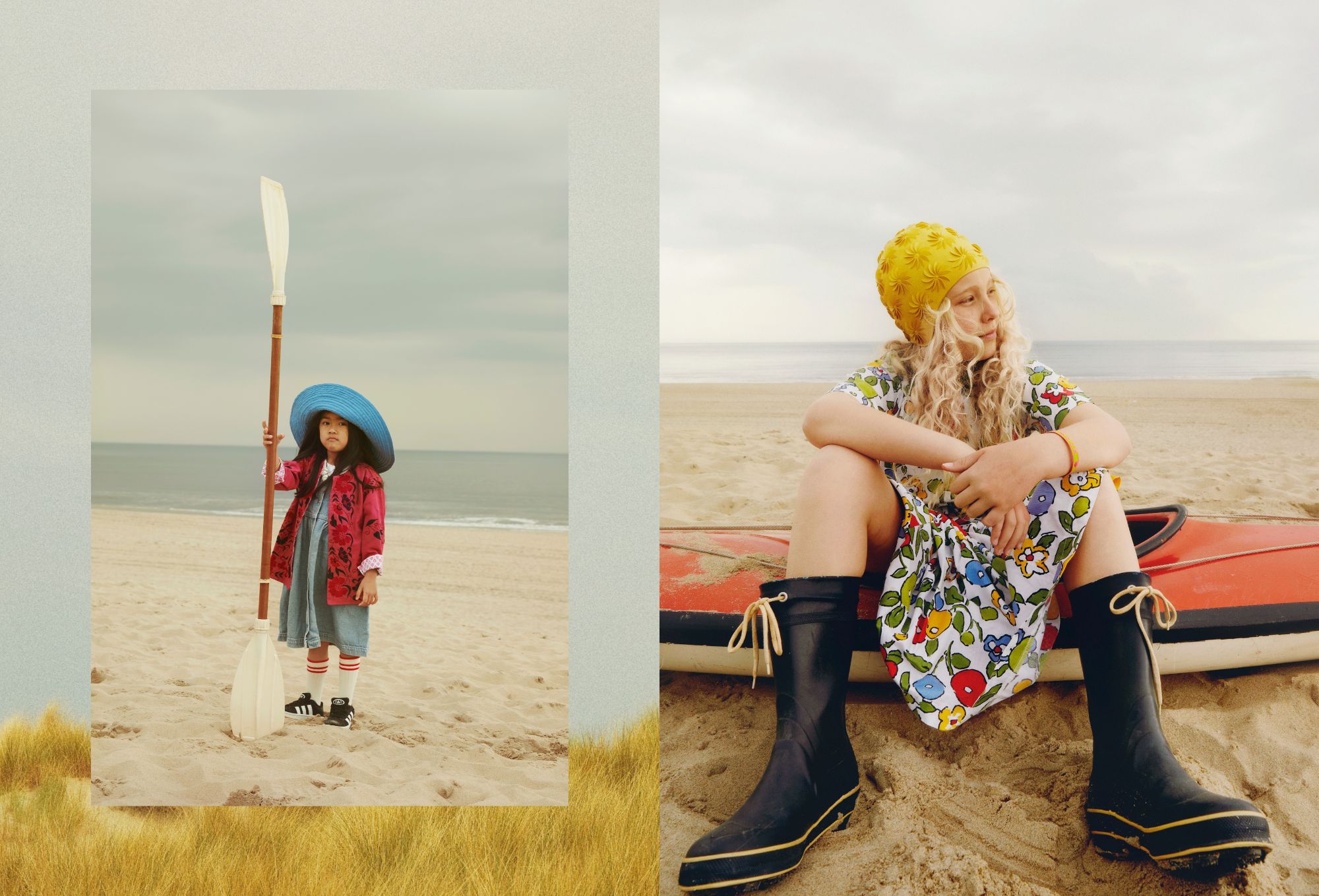 Left: A young girl stands on the beach holding a tall paddle, wearing a bright blue wide-brimmed hat, a pink embroidered jacket, and a denim dress with striped socks and sneakers. The sea is calm behind her under a cloudy sky. Right: A child with long curly hair sits on a red kayak in the sand, wearing a colorful floral dress, black rain boots, and a bright yellow retro swim cap, gazing thoughtfully toward the horizon.