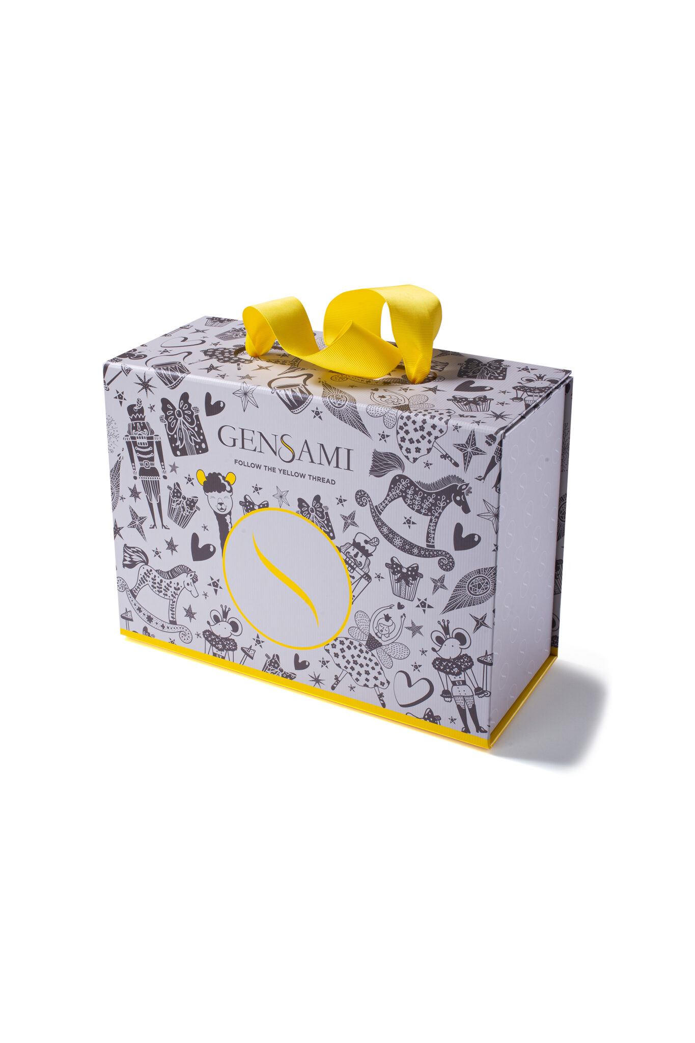 Gensami FW25 gift box with black illustrations and yellow ribbon handle.