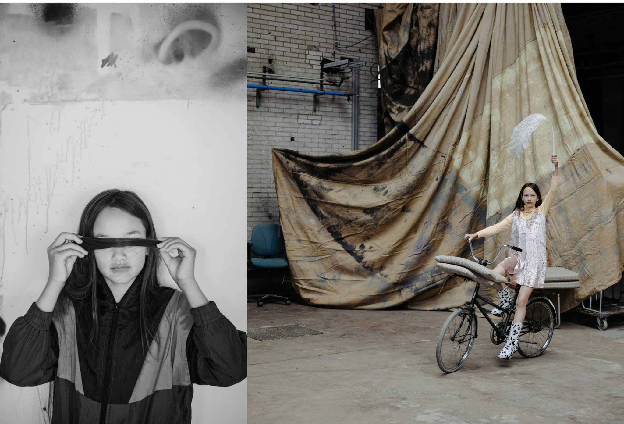 On the left, a black-and-white portrait of a girl in a color-block windbreaker jacket, holding a strand of her hair across her eyes as if to cover them. On the right, the same girl poses indoors on a bicycle, wearing a pale pink lace dress over a long-sleeve top, spotted black-and-white boots, and holding a sheer fabric piece aloft like a flag, with large draped fabric as a backdrop. Fashion editorial photographed by Aarjan Hamel for Scimparello Magazine.