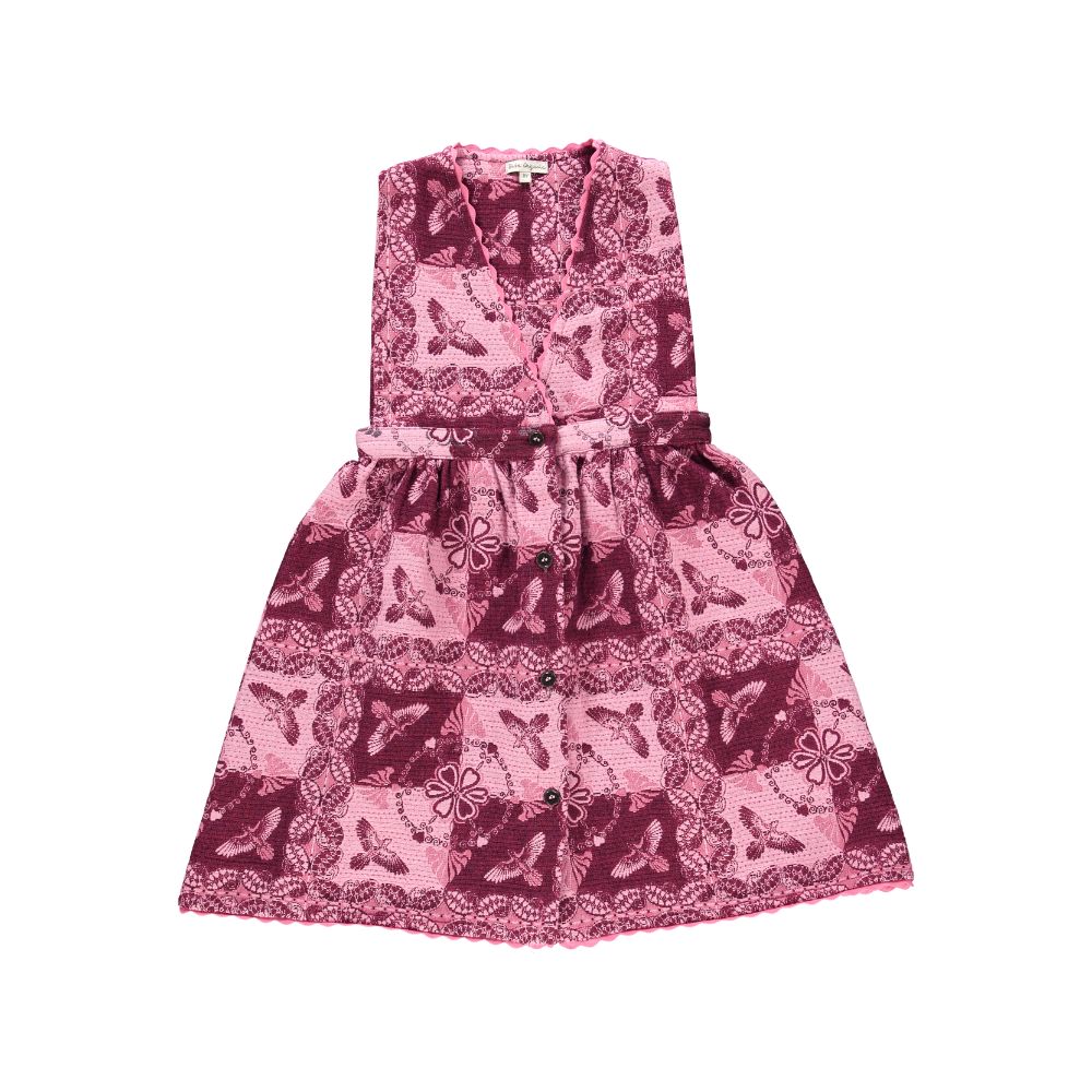 Pink and burgundy printed dress with butterfly and floral patterns, part of the Mystical Gypsy kids fashion look for Scimparello Magazine FW25.