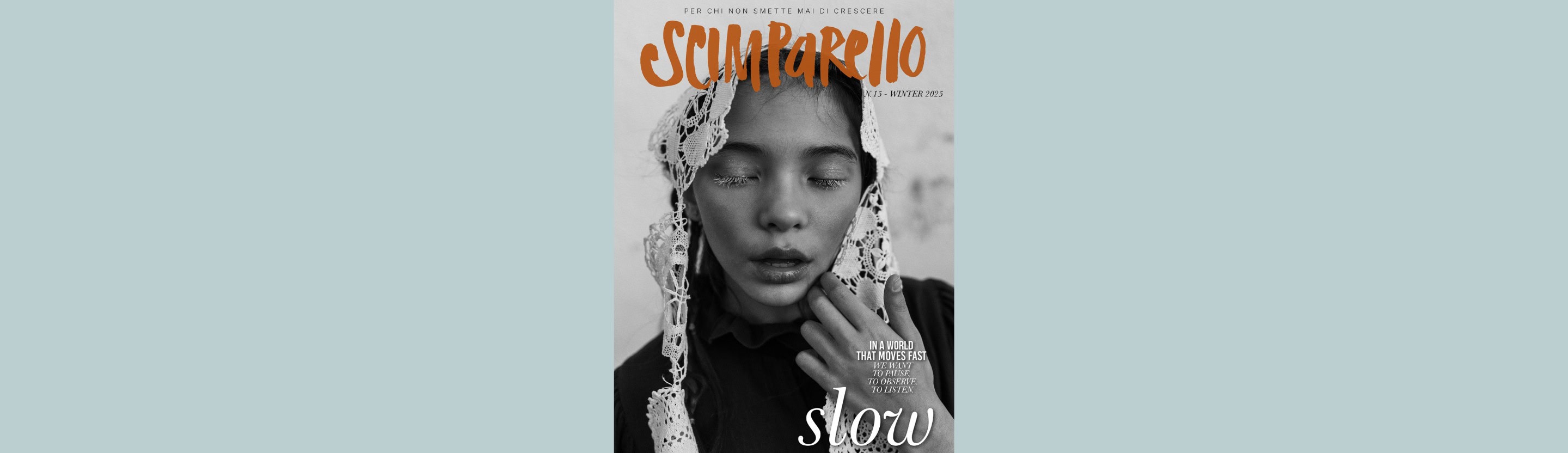 Black and white cover of Scimparello Magazine N°15 Winter 2025, titled Slow. A girl with closed eyes wears a lace headpiece, symbolizing calm and introspection. Photo captures the essence of slowing down and observing beauty in stillness.