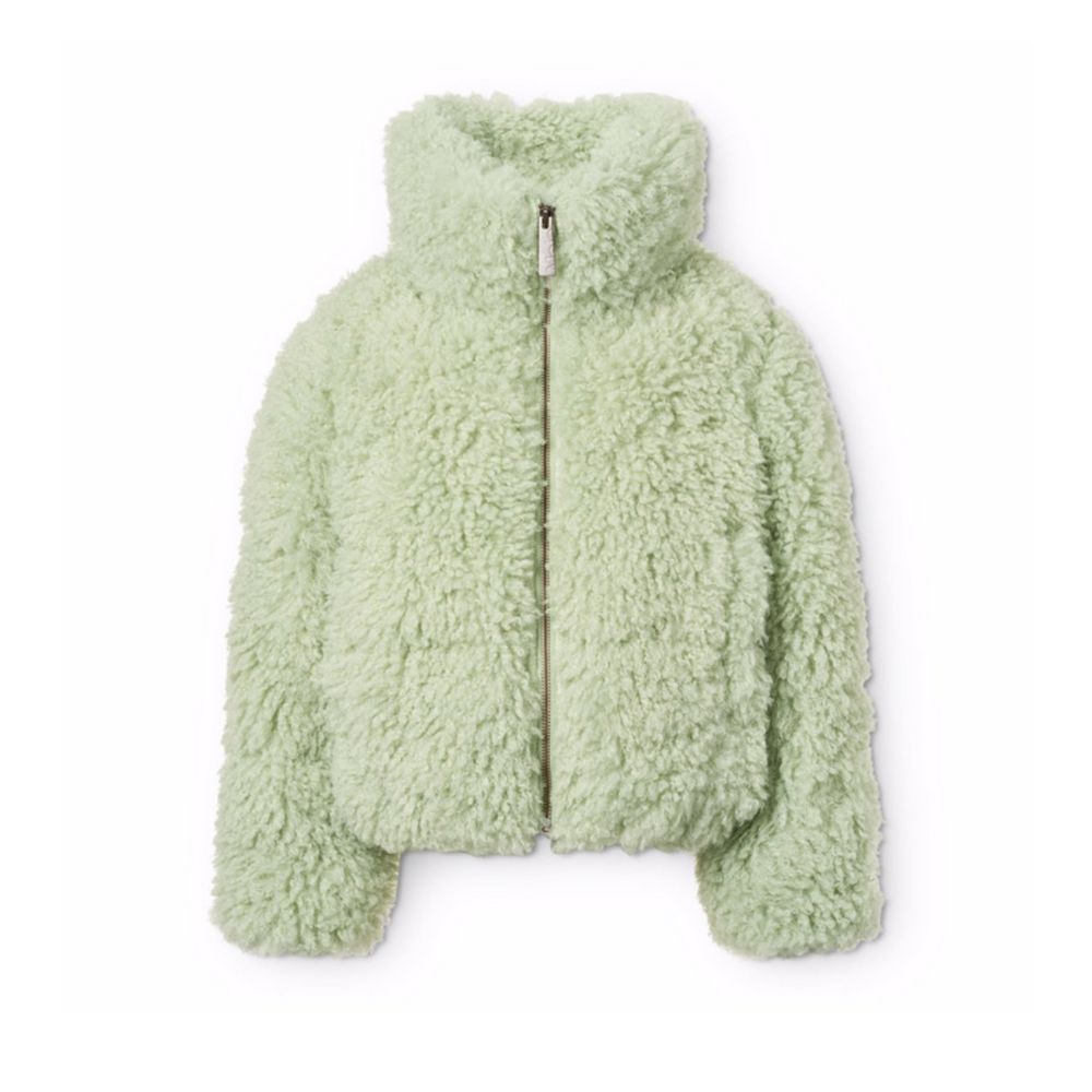 Mint-green teddy jacket by MOLO, featured on Scimparello Magazine. Soft, fluffy, and cozy with a high collar and front zip — a perfect winter staple for kids.