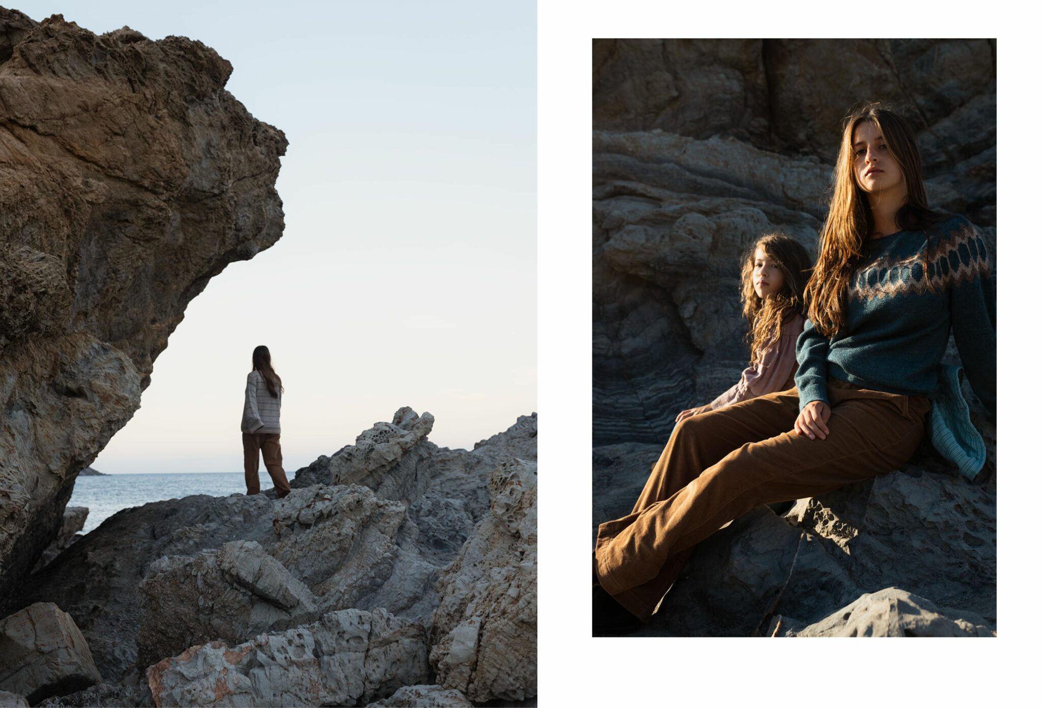 Two children on rocky coastal cliffs; on the left, an older child stands facing the sea beneath a large rock formation, and on the right, two children sit on sunlit rocks wearing knitwear and earthy tones. Photo by Manuela Franjou for Scimparello Magazine.