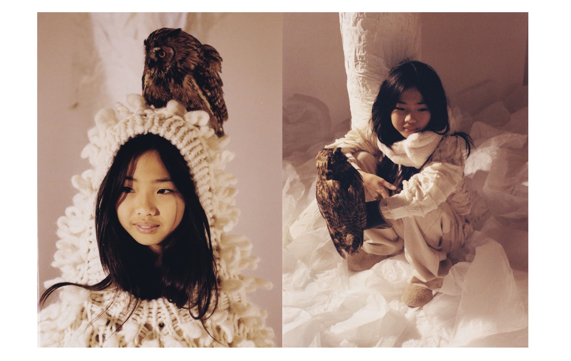Girl in a sculptural white knit hood with an owl perched above her, and seated on soft winter textures beside the same owl; editorial Wild Within for Scimparello Magazine, FW25. Photo by Emma Wright, styling by Holly Moluluo.