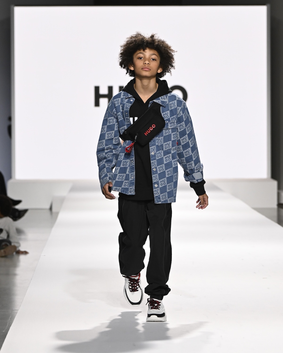 A model wearing an original creation from the Kids Around fashion Show