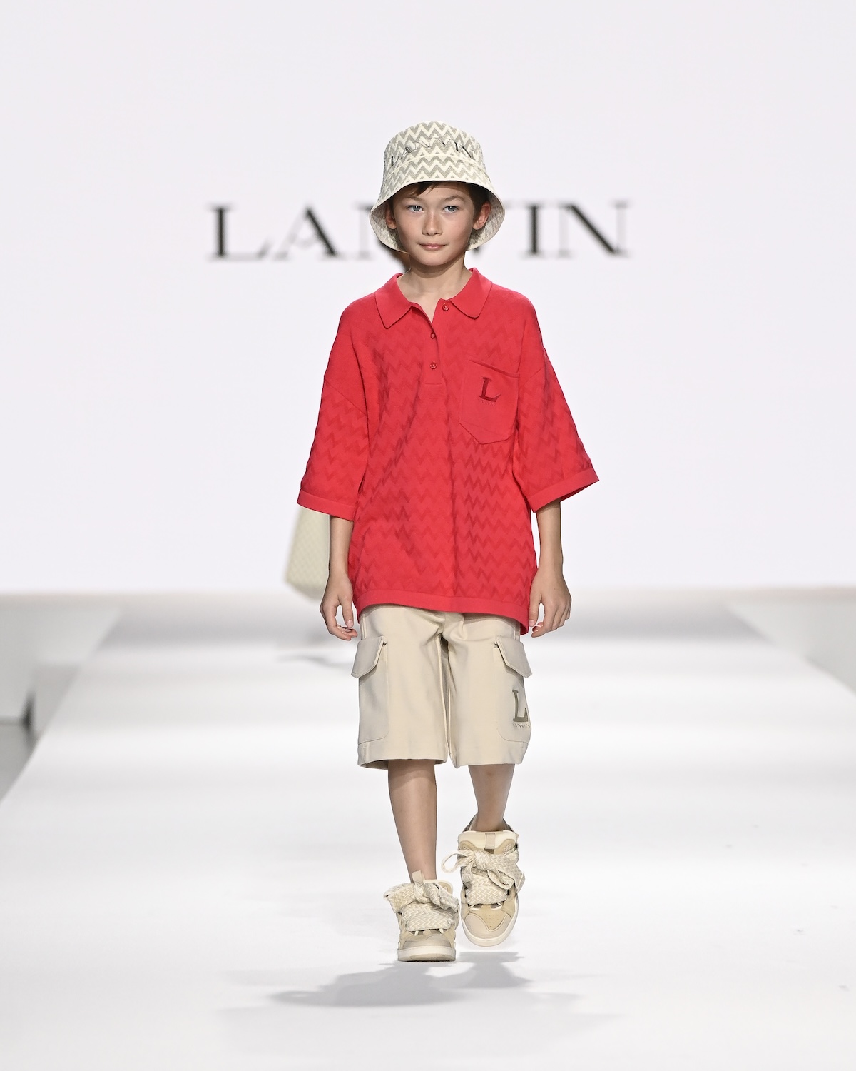 A model wearing an original creation from the Kids Around fashion Show