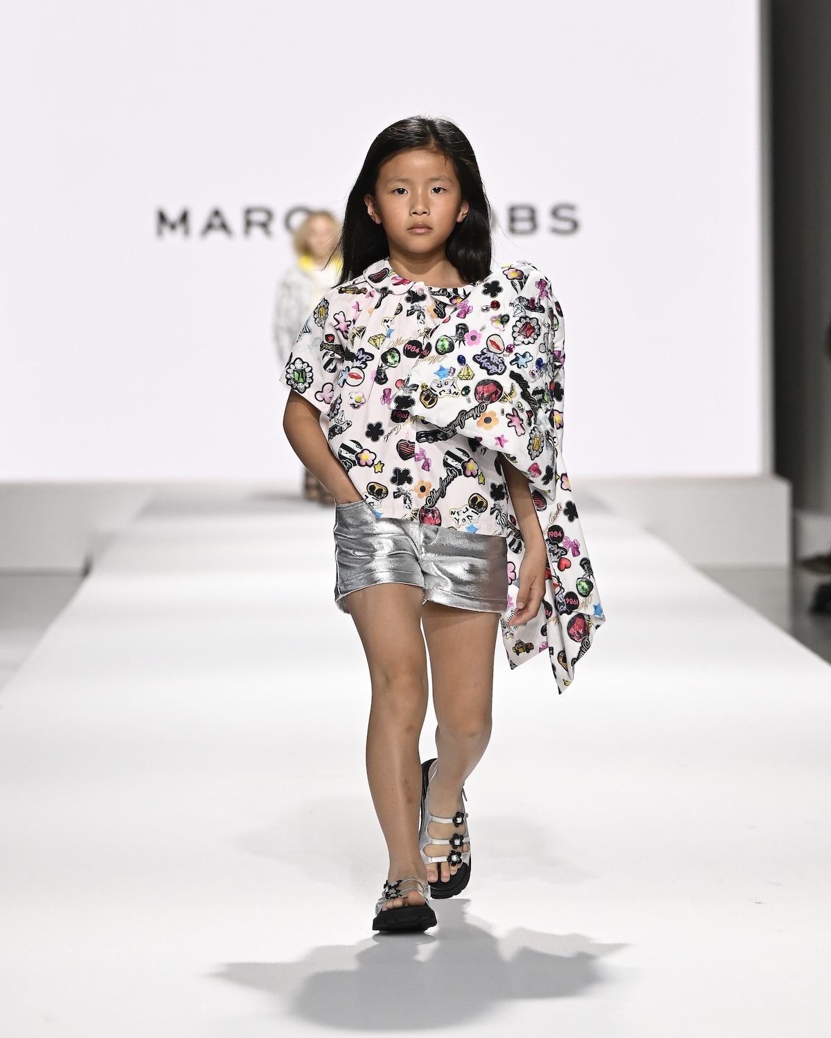 A model wearing an original creation from the Kids Around fashion Show