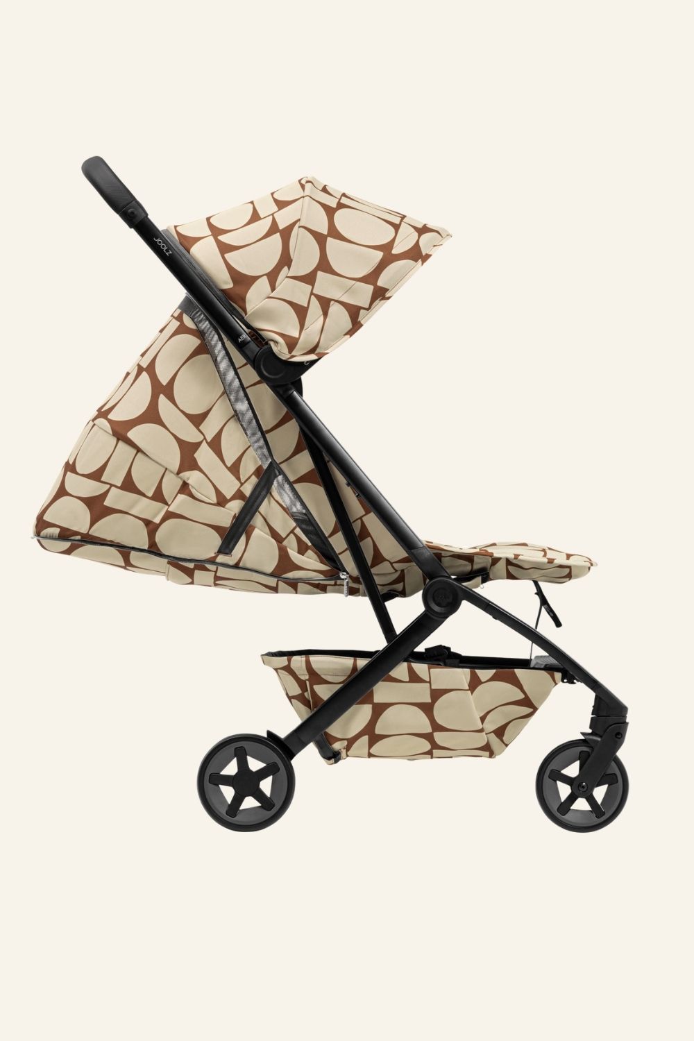 Side view of the Joolz Aer² compact stroller in exclusive boho print with black frame, featured by Scimparello Magazine