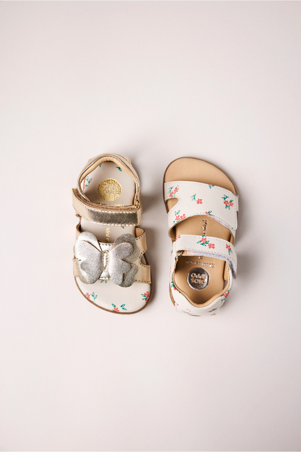 Top view of Gioseppo Kids SS26 floral baby sandals with gold butterfly detail, featured in the Freedom to Celebrate collection for Scimparello Magazine.