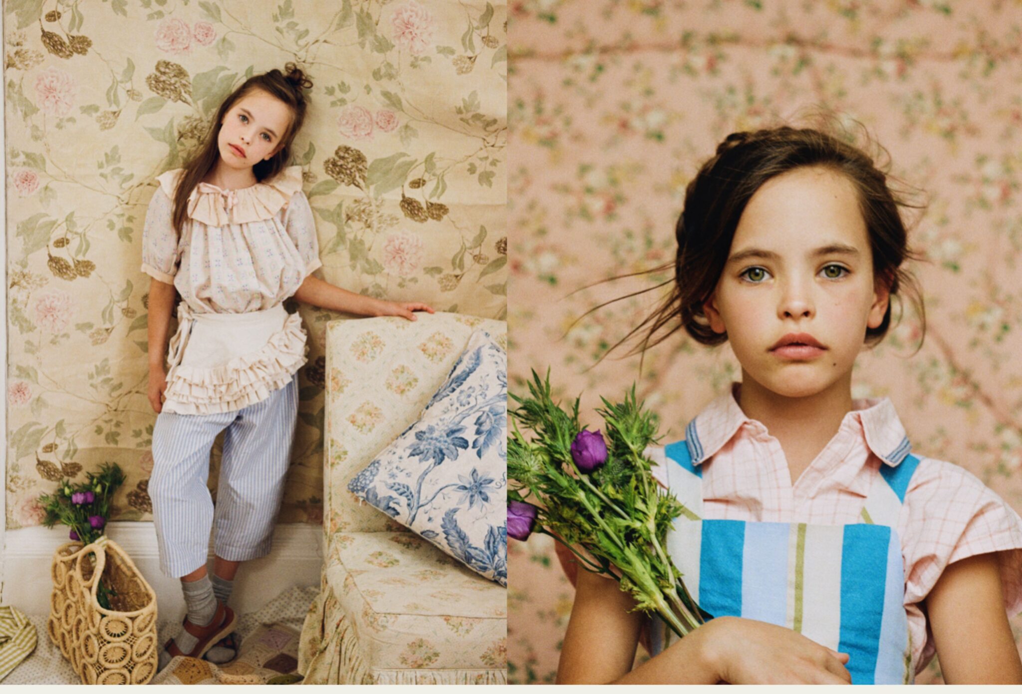 Girl in soft layered kids fashion looks appears across a double-page spread with vintage floral wallpaper, striped trousers, ruffled details and a bouquet of purple flowers for Scimparello Magazine editorial Printed Heirlooms by Emma Wright.