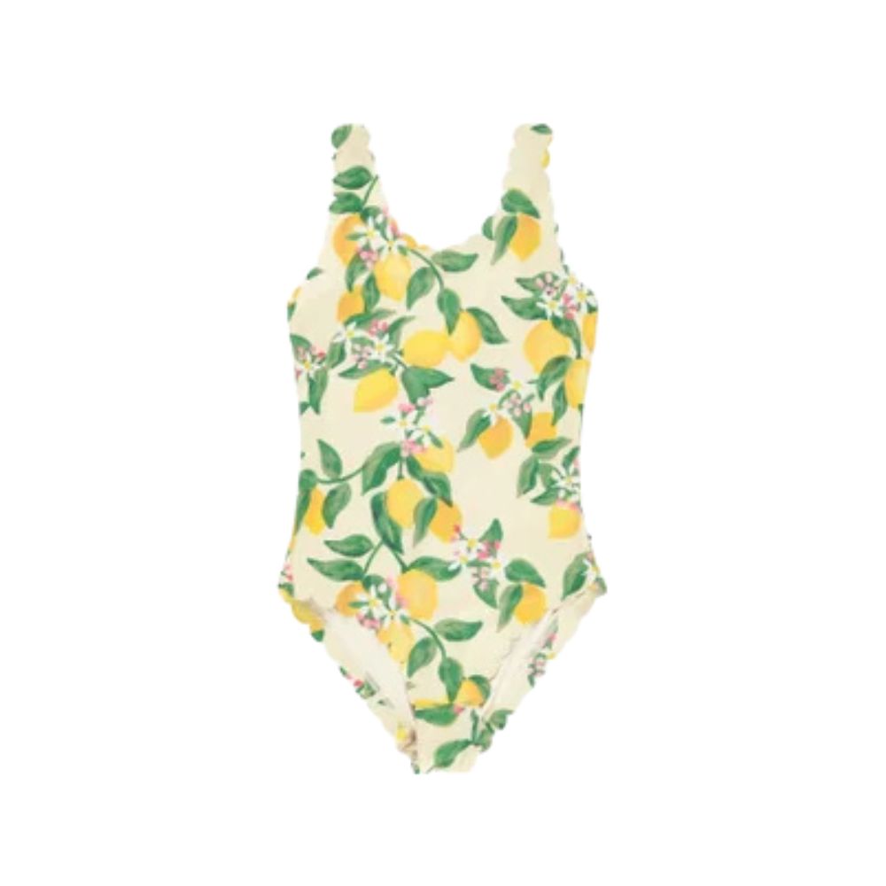 Lemon-print bathing suit Molowith scalloped straps, styled for a Shop Floral Skirts selection by Scimparello Magazine.