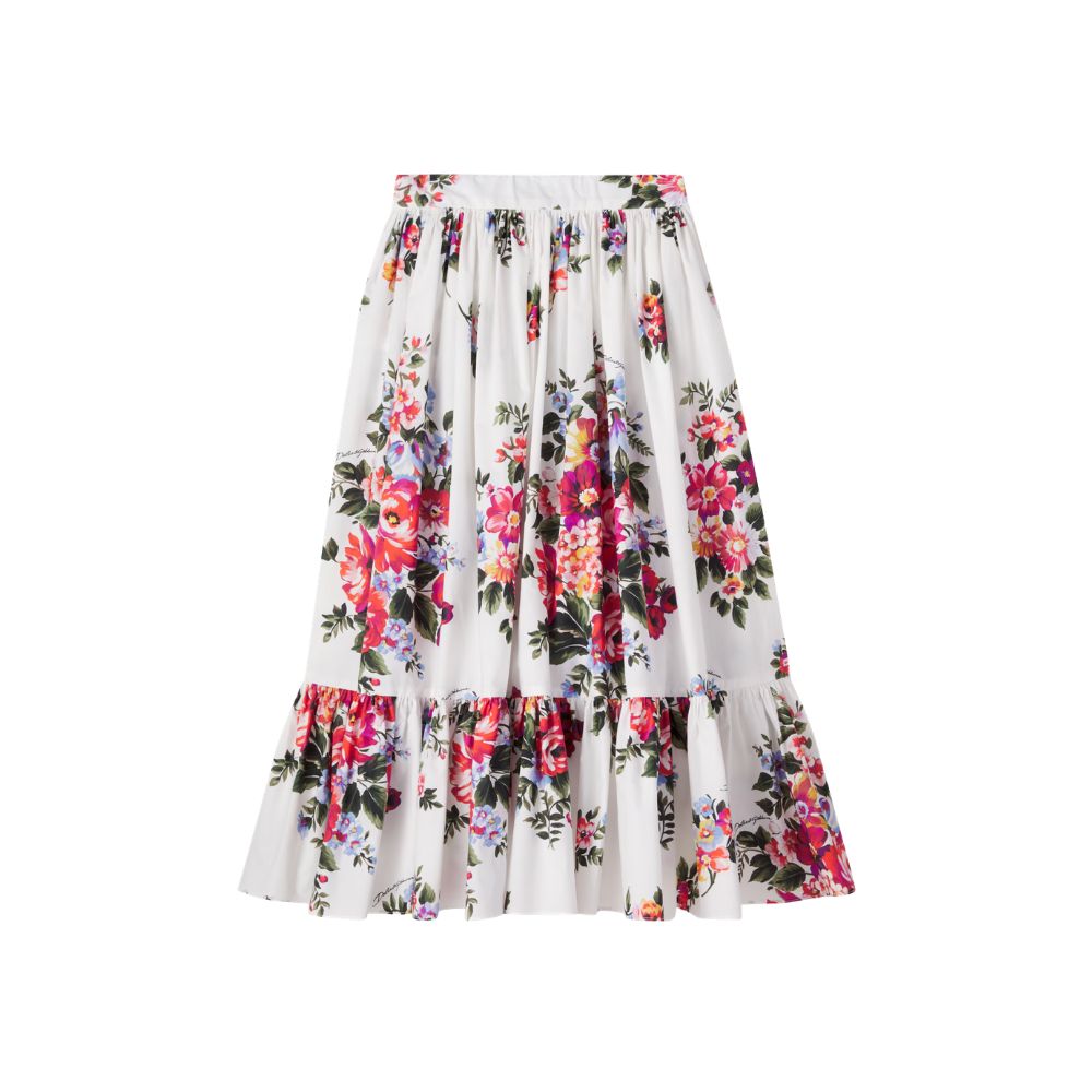 White Dolce&Gabbana floral skirt with bright red, pink and blue flower print, styled for a Shop Floral Skirts selection by Scimparello Magazine.