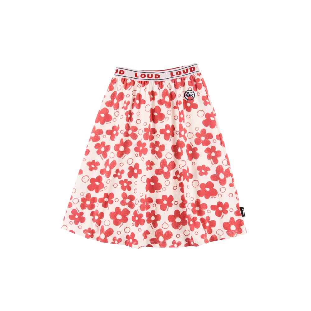 Red floral skirt by LOUD with an elastic logo waistband on a white background, featured in Scimparello Magazine’s shop floral skirts selection.