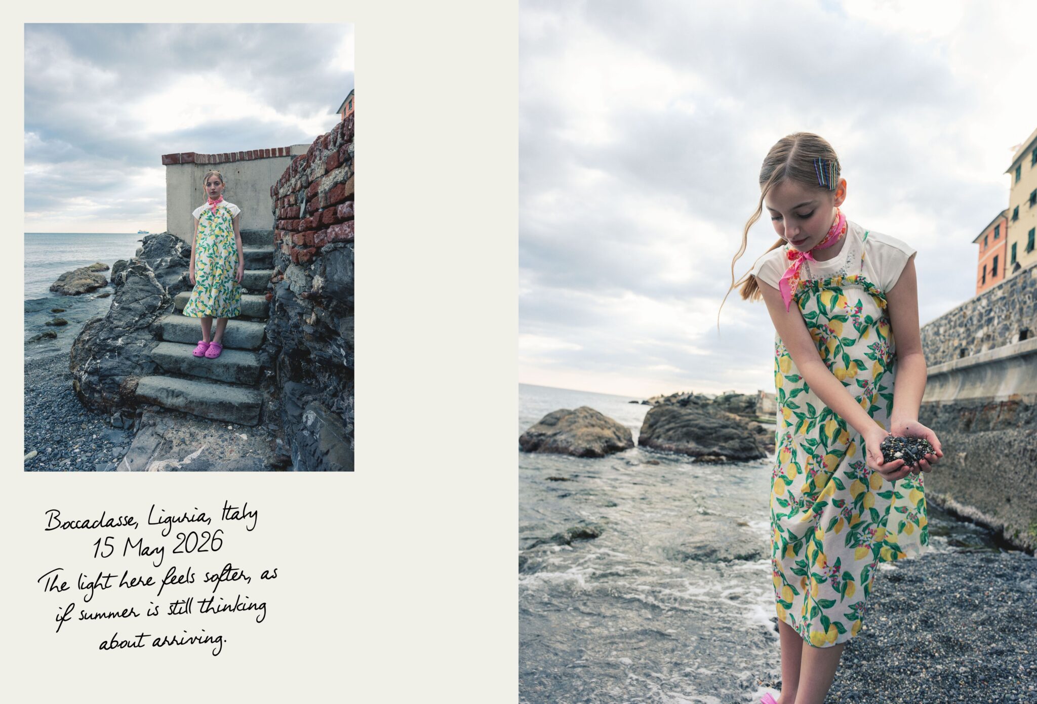 Girl in a lemon-print summer dress standing by the rocky seaside in Boccadasse, Liguria, with diary-style notes on the page, photographed by Ilaria & Silvia Cianciaruso for Scimparello Magazine.