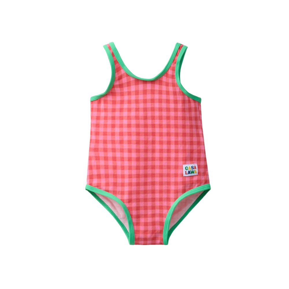 Pink gingham girls’ swimsuit Zara Kids with green trim on a white background, featured in Scimparello Magazine’s shop floral skirts styling selection.