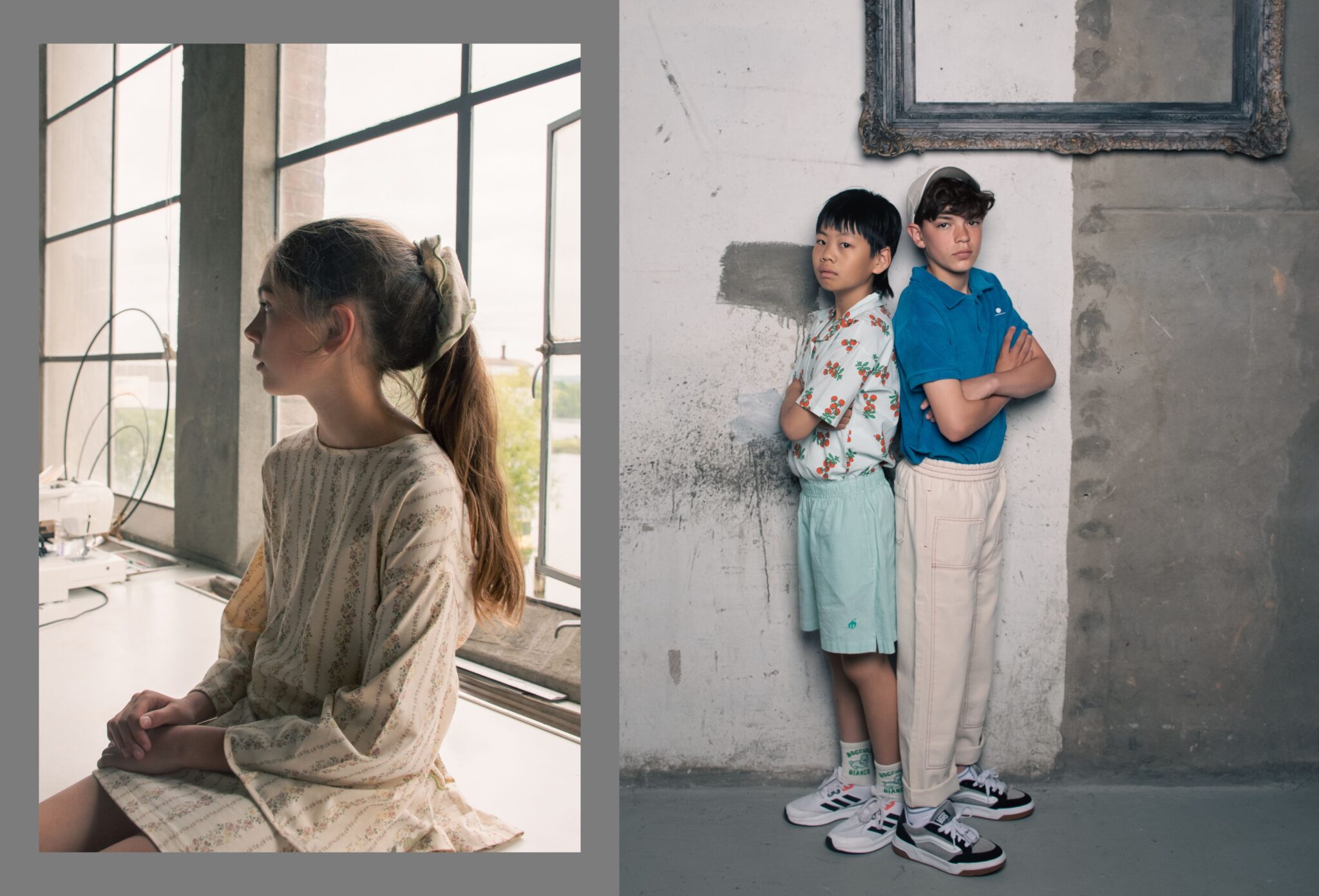 Girl sitting by an industrial window in a soft floral dress, alongside two boys posing against a textured wall in casual summer looks, in the Friends Forever kids fashion editorial photographed by Danique Daemen, Scimparello Magazine.