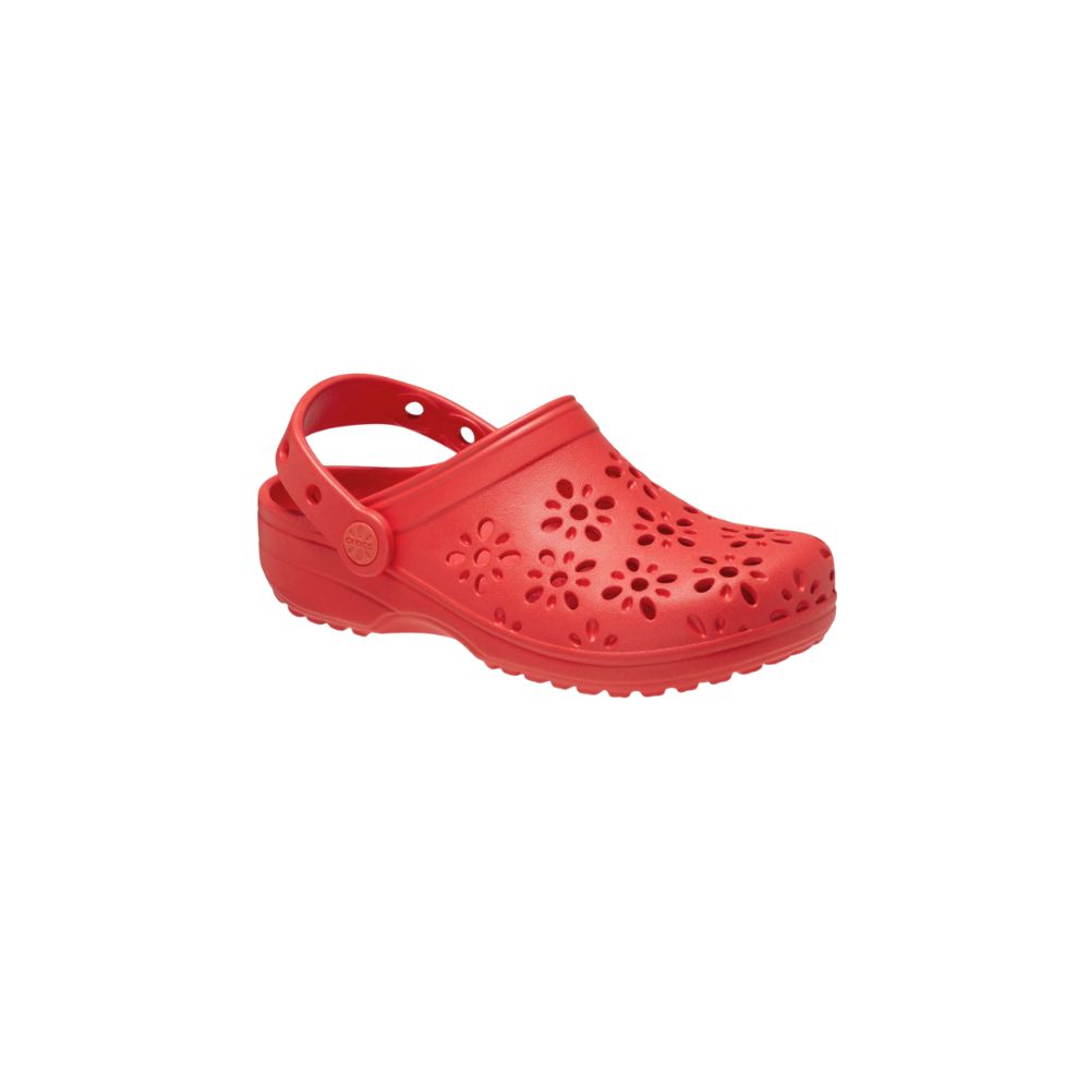 Red Crocs clog with floral cut-out details on a white background, featured in Scimparello Magazine’s shop floral skirts styling selection.