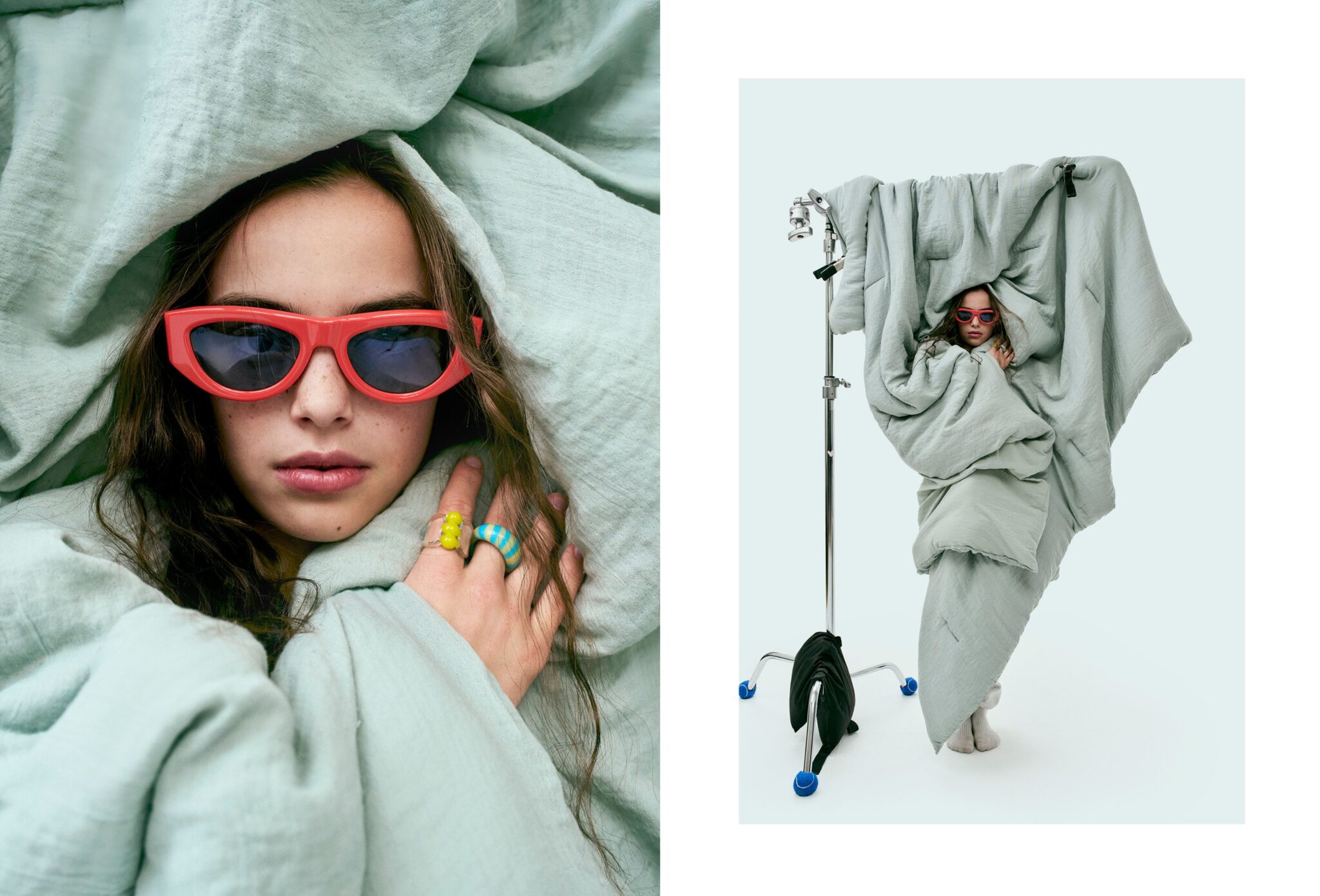 Teen pyjama fashion editorial Day Sleepers photographed by Erin Foster and styled by Julie Williams, featuring a girl wrapped in pale green bedding with red sunglasses and playful rings for Scimparello Magazine.