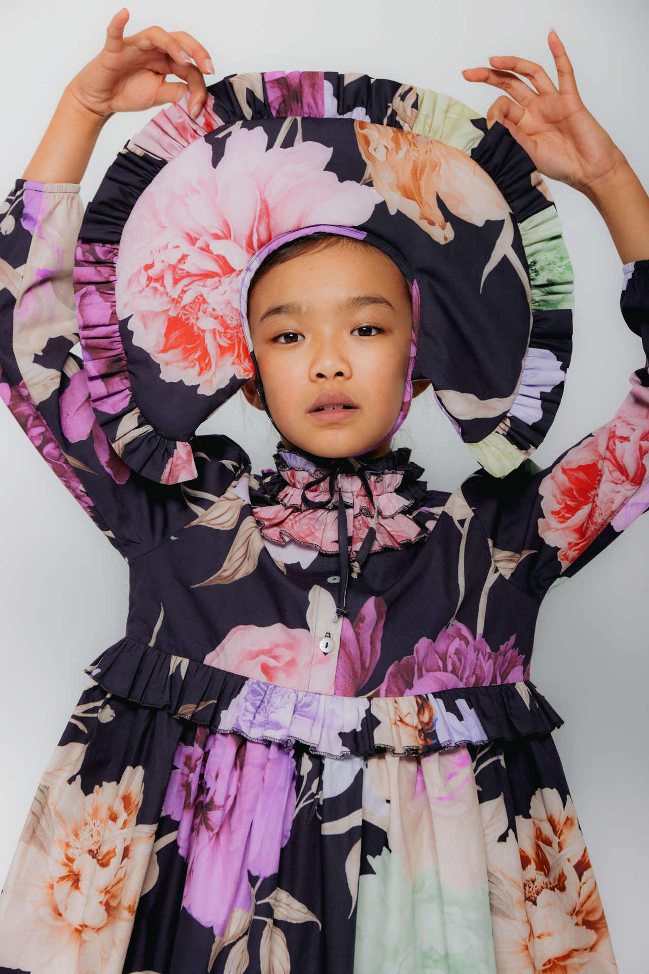 Christina Rohde AW26 floral dress with oversized pink and purple flower prints and ruffled collar