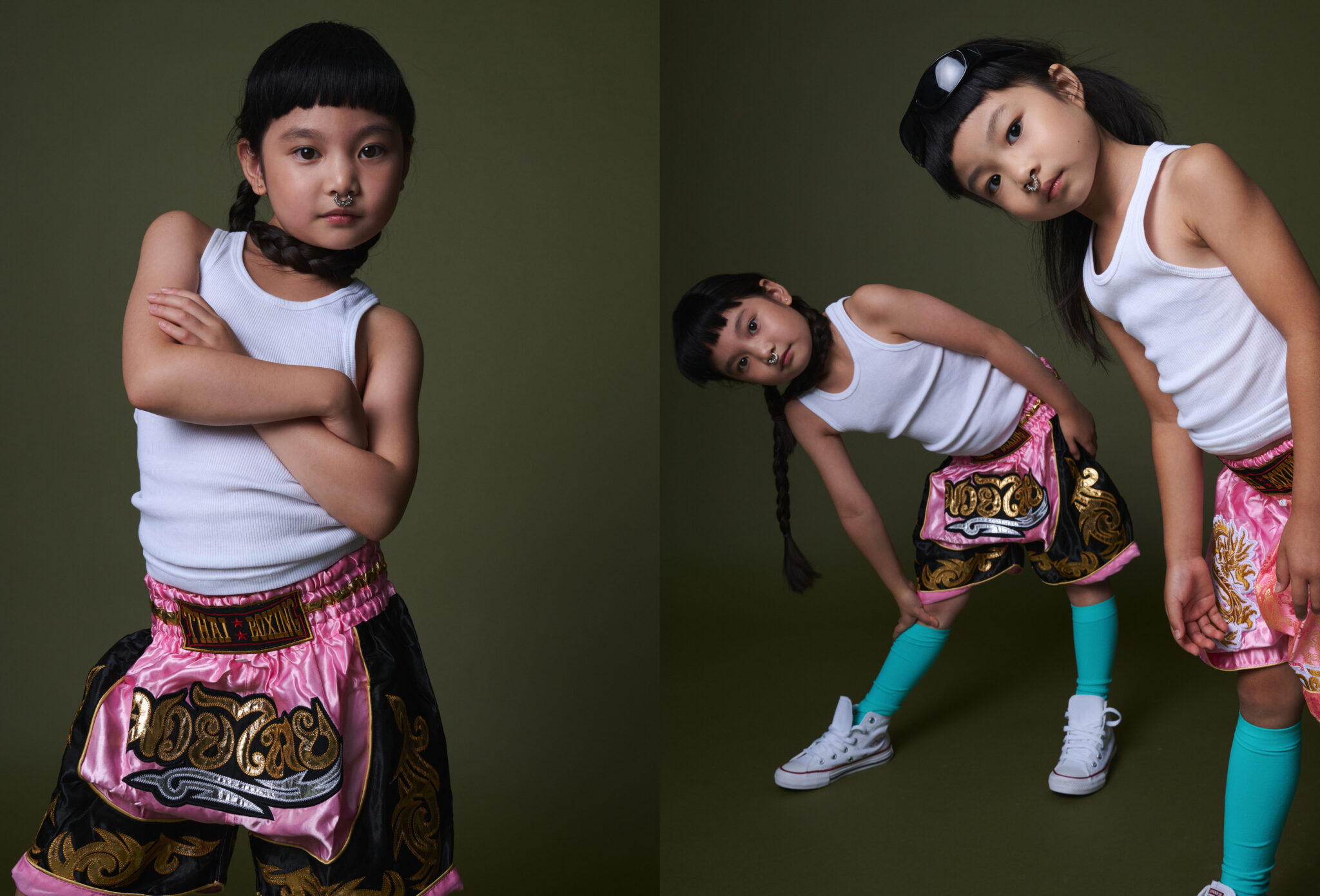 A girl in a white tank top and Thai boxing shorts with arms crossed, and two girls stretching in Thai boxing shorts and turquoise socks